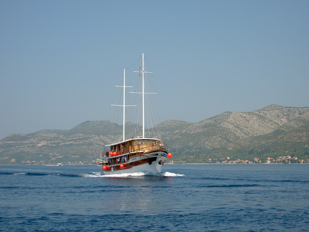 Traditional small cruise boat in Korcula channel