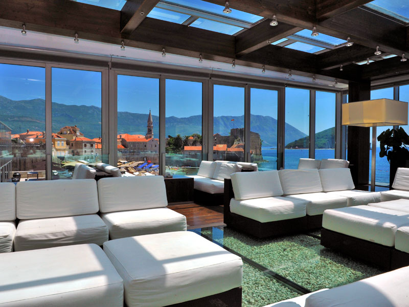 Lounge overlooking sea and old town of Budva, Avala Villas Resort
