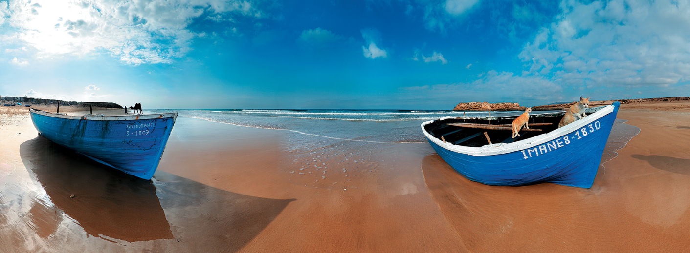 Small fishing boats on a quiet beach in southern Morocco