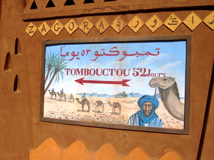 52 Days to Timbuktou by camel (sign at edge of Zagora)